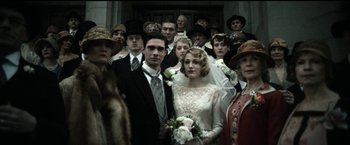 Movie still from “The Age of Adaline” (2015), directed by Lee Toland Krieger – A group of people standing in front of each other; Medium shot, Low angle