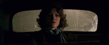 Movie still from “The Age of Adaline” (2015), directed by Lee Toland Krieger – A woman sitting in the back seat of a car; Close Up shot, Low angle