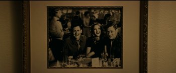 Movie still from “The Age of Adaline” (2015), directed by Lee Toland Krieger – A group of people sitting at a dinner table; Medium shot, High angle