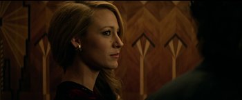 Movie still from “The Age of Adaline” (2015), directed by Lee Toland Krieger – A person wearing a red shirt; Close Up shot, Over the shoulder angle