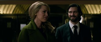 Movie still from “The Age of Adaline” (2015), directed by Lee Toland Krieger – A man and a woman standing next to each other; Medium shot, Over the shoulder angle