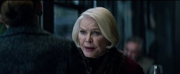 Movie still from “The Age of Adaline” (2015), directed by Lee Toland Krieger – An older woman with blonde hair and blue eyes; Close Up shot, Over the shoulder angle