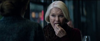Movie still from “The Age of Adaline” (2015), directed by Lee Toland Krieger – An older woman eating a piece of cake; Close Up shot, Over the shoulder angle