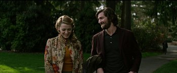 Movie still from “The Age of Adaline” (2015), directed by Lee Toland Krieger – A man and a woman smiling for the camera; Medium shot, Over the shoulder angle