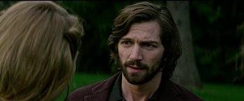 Movie still from “The Age of Adaline” (2015), directed by Lee Toland Krieger – A person with a beard; Close Up shot, Over the shoulder angle