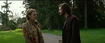 Movie still from “The Age of Adaline” (2015), directed by Lee Toland Krieger – A man and a woman standing next to each other on the street; Medium shot, Low angle