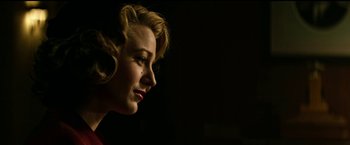 Movie still from “The Age of Adaline” (2015), directed by Lee Toland Krieger – A woman with blonde hair is looking to the side; Close Up shot, Low angle