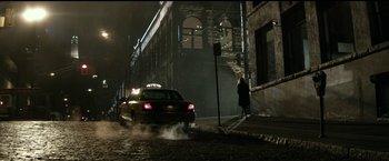 Movie still from “The Age of Adaline” (2015), directed by Lee Toland Krieger – A taxi cab driving down a street at night; Extreme Wide shot, Low angle