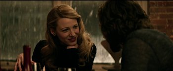 Movie still from “The Age of Adaline” (2015), directed by Lee Toland Krieger – A woman smiles while talking to a man; Close Up shot, Over the shoulder angle