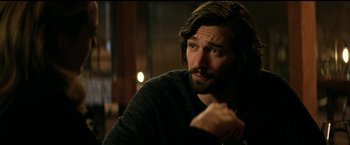 Movie still from “The Age of Adaline” (2015), directed by Lee Toland Krieger – A person with long hair and a beard; Close Up shot, Over the shoulder angle