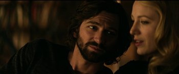 Movie still from “The Age of Adaline” (2015), directed by Lee Toland Krieger – A person with long hair and a beard; Close Up shot, Over the shoulder angle