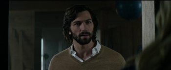 Movie still from “The Age of Adaline” (2015), directed by Lee Toland Krieger – A person with long hair and beard; Close Up shot, Over the shoulder angle