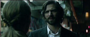 Movie still from “The Age of Adaline” (2015), directed by Lee Toland Krieger – A man with long hair talking to another man; Close Up shot, Over the shoulder angle