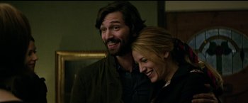Movie still from “The Age of Adaline” (2015), directed by Lee Toland Krieger – A man and a woman smiling for the camera; Medium shot, Low angle
