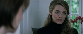 Movie still from “The Age of Adaline” (2015), directed by Lee Toland Krieger – A person wearing a black shirt; Close Up shot, Over the shoulder angle
