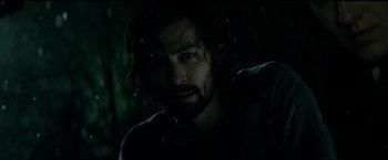 Movie still from “The Age of Adaline” (2015), directed by Lee Toland Krieger – A person with long hair and a beard; Close Up shot, Over the shoulder angle