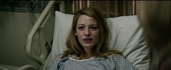 Movie still from “The Age of Adaline” (2015), directed by Lee Toland Krieger – A woman laying in a hospital bed with a bandage on her head; Close Up shot, High angle