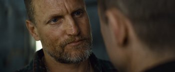 Movie still from “Out of the Furnace” (2013), directed by Scott Cooper – A person with a beard; Close Up shot, Over the shoulder angle