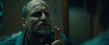 Movie still from “Out of the Furnace” (2013), directed by Scott Cooper – An old man with a beard is looking at the camera; Close Up shot, Low angle