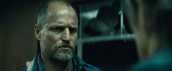 Movie still from “Out of the Furnace” (2013), directed by Scott Cooper – A person with a beard; Close Up shot, Low angle