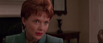Movie still from “The American President” (1995), directed by Rob Reiner – A person with short hair; Close Up shot, Low angle