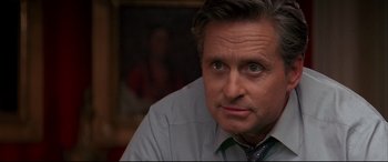 Movie still from “The American President” (1995), directed by Rob Reiner – A person wearing a shirt and tie; Close Up shot, Over the shoulder angle