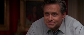 Movie still from “The American President” (1995), directed by Rob Reiner – A person wearing a dress shirt and tie; Close Up shot, Over the shoulder angle