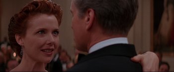 Movie still from “The American President” (1995), directed by Rob Reiner – A man and a woman are talking to each other; Close Up shot, Over the shoulder angle