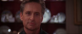 Movie still from “The American President” (1995), directed by Rob Reiner – A man's face in front of a mirror; Close Up shot, Over the shoulder angle