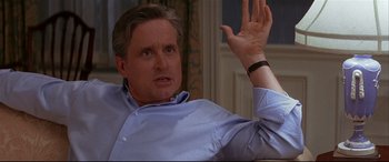 Movie still from “The American President” (1995), directed by Rob Reiner – A person sitting in a room; Close Up shot, Over the shoulder angle