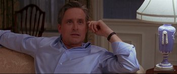 Movie still from “The American President” (1995), directed by Rob Reiner – A person wearing a blue shirt; Close Up shot, Over the shoulder angle