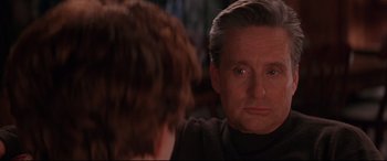 Movie still from “The American President” (1995), directed by Rob Reiner – An older man looking at a younger man in front of a mirror; Close Up shot, Over the shoulder angle