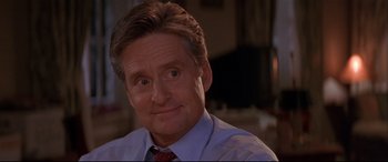 Movie still from “The American President” (1995), directed by Rob Reiner – A person wearing a shirt and a tie; Close Up shot, Over the shoulder angle