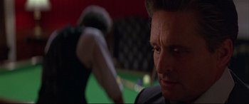 Movie still from “The American President” (1995), directed by Rob Reiner – A person playing a game of billiards; Close Up shot, Over the shoulder angle
