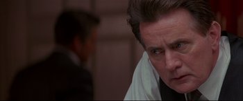 Movie still from “The American President” (1995), directed by Rob Reiner – A person with a white shirt; Close Up shot, Over the shoulder angle