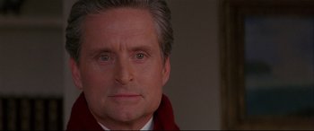 Movie still from “The American President” (1995), directed by Rob Reiner – A person wearing a suit and tie; Close Up shot, Over the shoulder angle