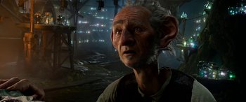 Movie still from “The BFG” (2016), directed by Steven Spielberg – An old man with a long white beard and ears; Close Up shot, Low angle