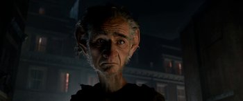 Movie still from “The BFG” (2016), directed by Steven Spielberg – An old man with a long white hair and a pointy ear; Close Up shot, Low angle