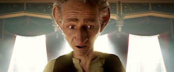 Movie still from “The BFG” (2016), directed by Steven Spielberg – An old man is looking at the camera; Close Up shot, Low angle