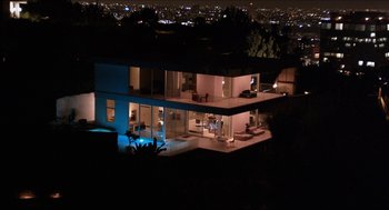Movie still from “The Bling Ring” (2013), directed by Sofia Coppola – An aerial view of a house at night with lights on; Extreme Wide shot, High angle