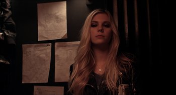 Movie still from “The Bling Ring” (2013), directed by Sofia Coppola – A beautiful blonde woman with long hair; Close Up shot, Low angle