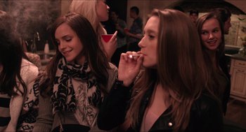 Movie still from “The Bling Ring” (2013), directed by Sofia Coppola – Two young women standing next to each other; Medium shot, Over the shoulder angle