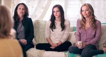 Movie still from “The Bling Ring” (2013), directed by Sofia Coppola – A group of women sitting on a couch; Medium shot, High angle