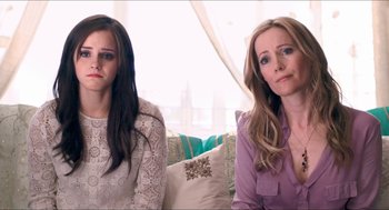 Movie still from “The Bling Ring” (2013), directed by Sofia Coppola – Two women sitting next to each other on a couch; Close Up shot, High angle