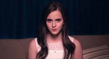 Movie still from “The Bling Ring” (2013), directed by Sofia Coppola – A person sitting on a couch; Close Up shot, Over the shoulder angle