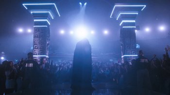 Movie still from “The Bodyguard” (1992), directed by Mick Jackson – A crowd of people standing in front of a stage; Wide shot, Low angle