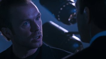 Movie still from “The Bodyguard” (1992), directed by Mick Jackson – A person in a dark room; Close Up shot, Over the shoulder angle