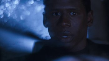Movie still from “The Bodyguard” (1992), directed by Mick Jackson – A man's face in the dark; Close Up shot, Over the shoulder angle
