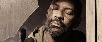 Movie still from “The Book of Eli” (2010), directed by Allen Hughes – A person holding an open umbrella; Close Up shot, High angle