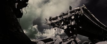 Movie still from “The Book of Eli” (2010), directed by Allen Hughes – A black and white photo of a pile of debris; Extreme Wide shot, Low angle